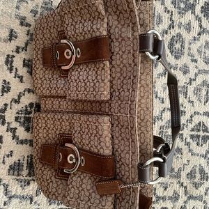 Selling a Coach Carryall in Signature Canvas.